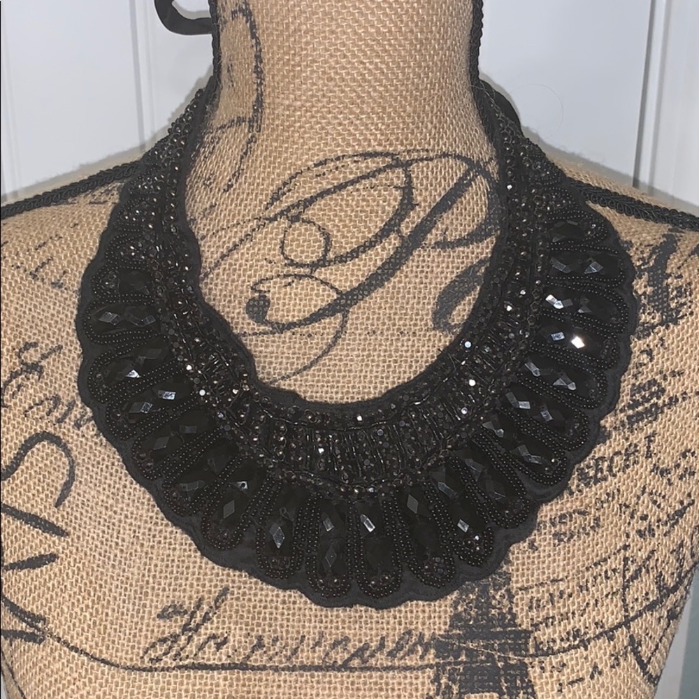 Black beaded bib style necklace